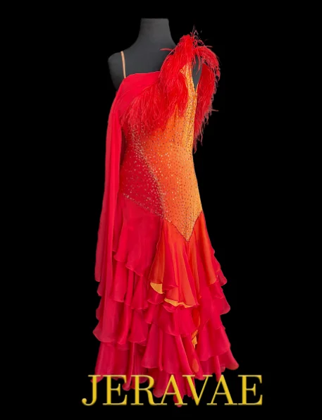 Sleeveless Red and Orange Ballroom Dress with Long Multi-Layered Chiffon Skirt, Attached Float, Feather Detail on One Shoulder, and Swarovski Stones Sz M Smo216 Sleeveless Red and Orange Ballroom Dress with Long Multi-Layered Chiffon Skirt, Attached Float, Feather Detail on One Shoulder, and Swarovski Stones Sz M Smo216